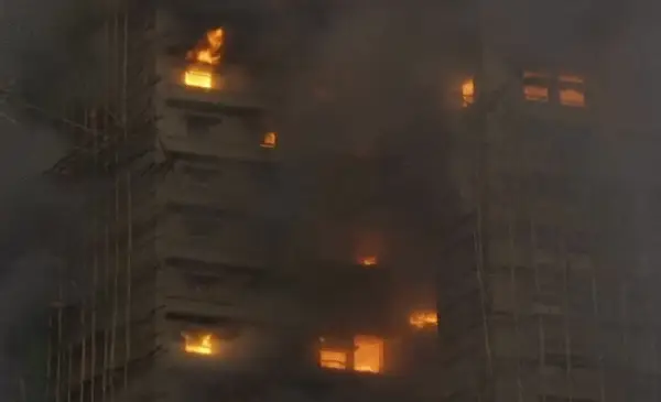 Three people have been arrested in Hong Kong after a high-rise fire left at least 44 dead and 279 missing