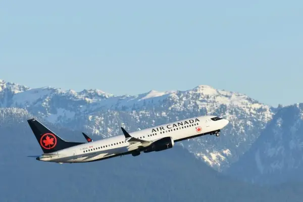 Air Canada flight attendants vote 99.7% for strike option