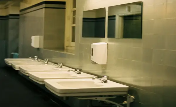 B.C. traditional Chinese medicine practitioner allegedly used a mirror to peek under a washroom door