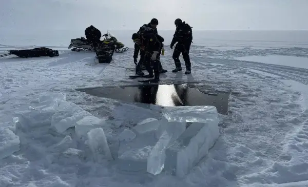 Two snowmobilers found dead beneath ice on northwestern B.C. lake
