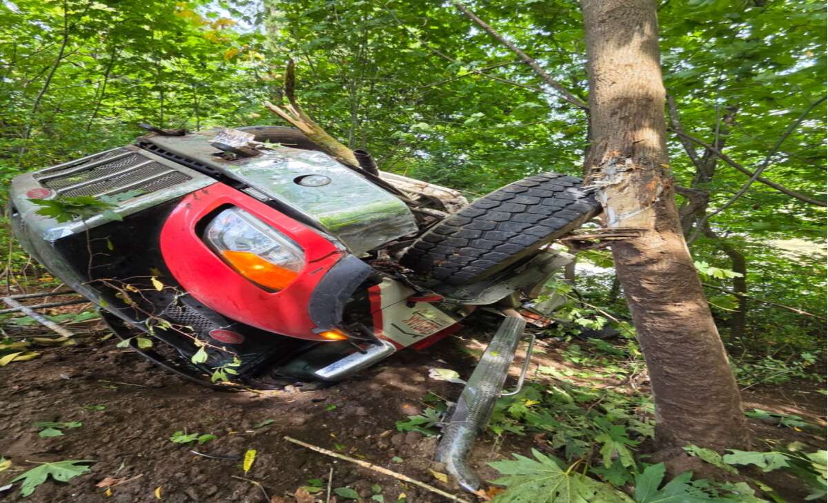 Roll-Off bin truck crashes down embankment in New Westminster, driver suffers minor injuries 
