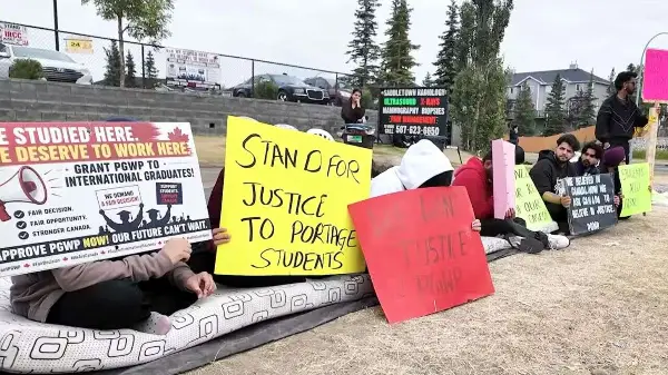 International students suspend protest after CBSA visit